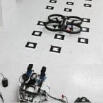 Cooperative and load-balancing auctions for heterogeneous multi-robot teams dealing with spatial and non-atomic tasks